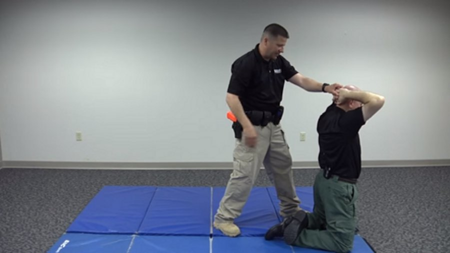 Kneeling Handcuff and Search Defensive Tactics Officer