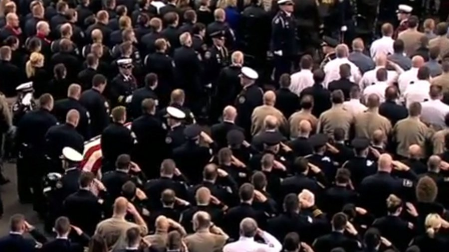 More than 3,500 people attended the funeral for Fargo Police Officer Jason Moszer at the Scheels Arena on Monday.