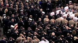 More than 3,500 people attended the funeral for Fargo Police Officer Jason Moszer at the Scheels Arena on Monday. More than 3,500 people attended the funeral for Fargo Police Officer Jason Moszer at the Scheels Arena on Monday.