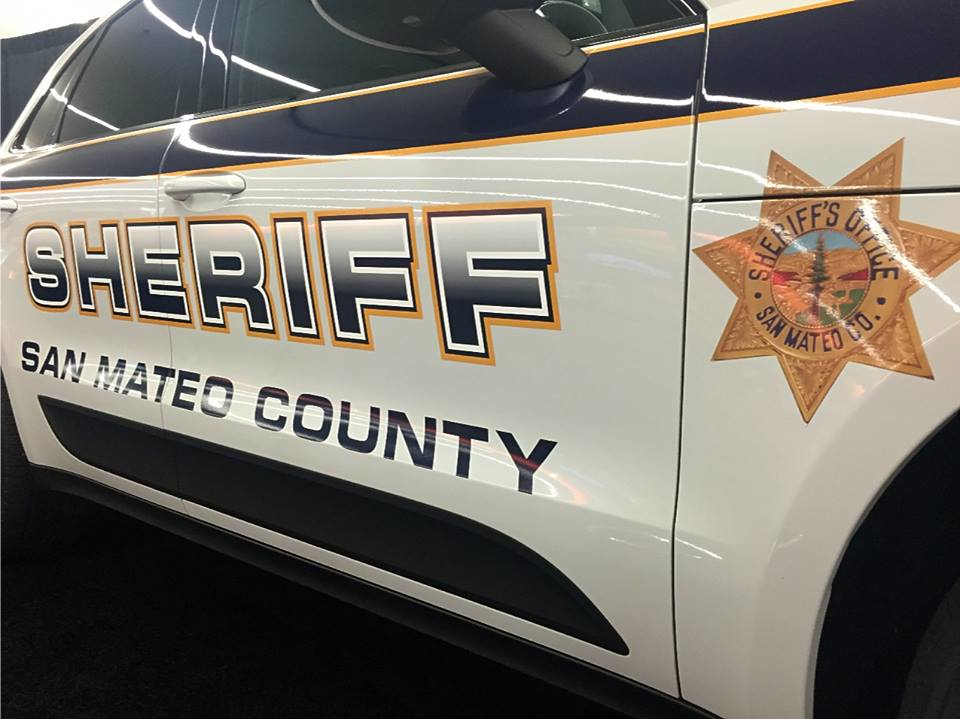 A San Mateo County sheriff's deputy suffered minor injuries early Thursday morning when a fleeing vehicle crashed into his patrol car head-on.