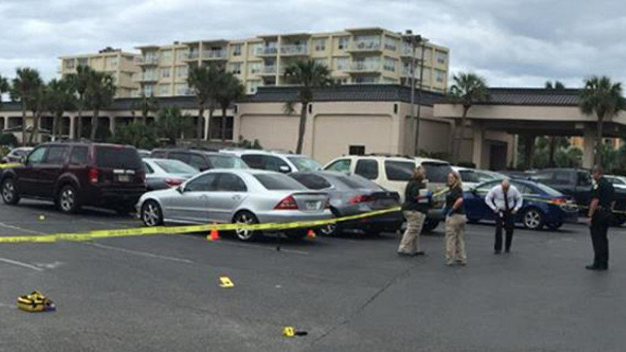 A person was killed and two others -- including an off-duty Escambia County, Florida Sheriff's deputy -- were wounded in a shooting outside a strip club early Wednesday morning.