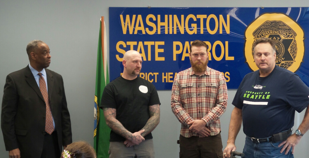 Good Samaritans Jason Cullen and Nathan Redman are seen with Trooper Tommie Pillow