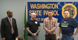 Good Samaritans Jason Cullen and Nathan Redman are seen with Trooper Tommie Pillow Good Samaritans Jason Cullen and Nathan Redman are seen with Trooper Tommie Pillow