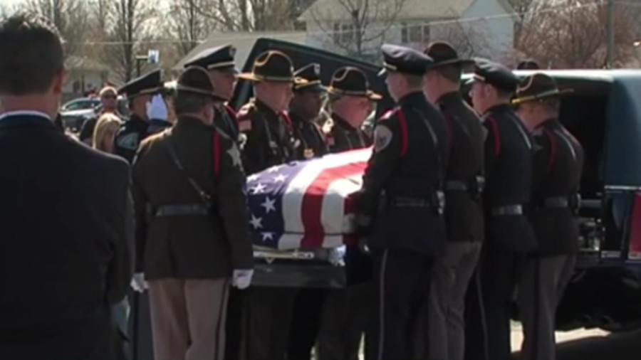 Thousands of law enforcement officers streaming past the casket of fallen Howard County Deputy Carl Koontz during his funeral Tuesday.