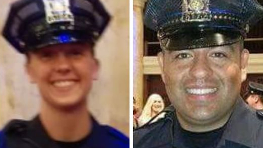 Officers Susan Farrell, left, and Carlos Puente-Morales