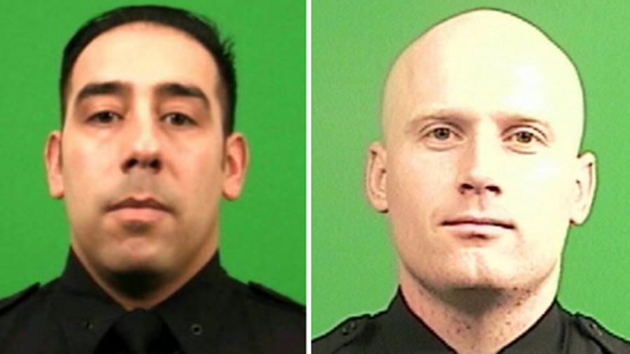 Detective John DiGregorio, left, and Officer Michael Urbanek