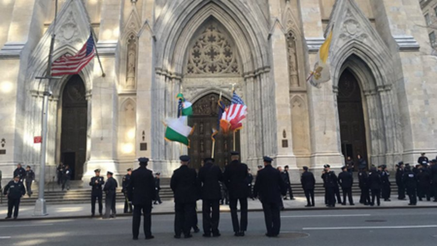 Hundreds of police officers lined Fifth Avenue in Manhattan for a farewell salute to Officer David Hofer on Monday.