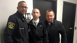 Officer Ed Morrison, center, is seen with Interim Police Chief Wayne James, left, and his uncle, Bob Morrison Officer Ed Morrison, center, is seen with Interim Police Chief Wayne James, left, and his uncle, Bob Morrison