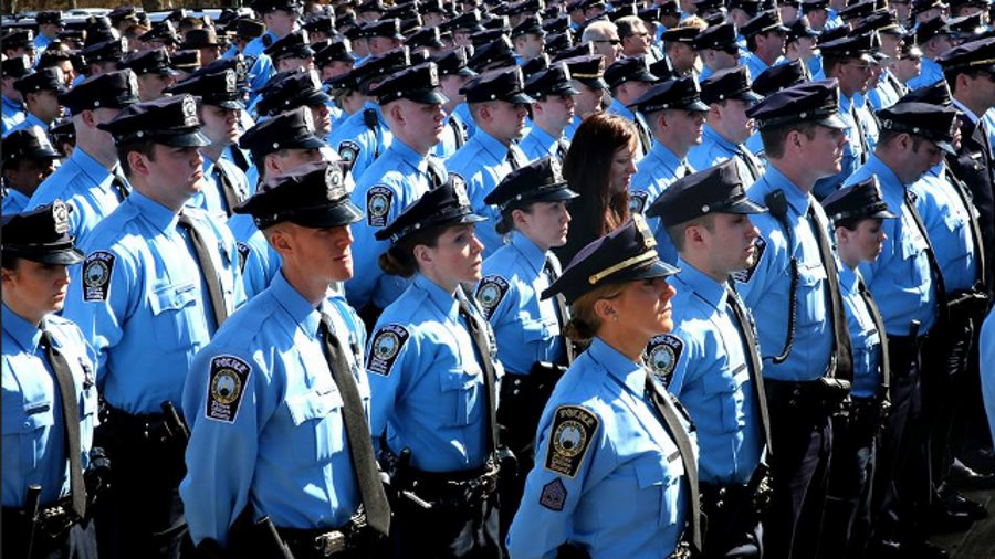 As thousands were honoring a fallen Prince William County police officer Tuesday, a bank robbery took place just three miles away from the funeral.