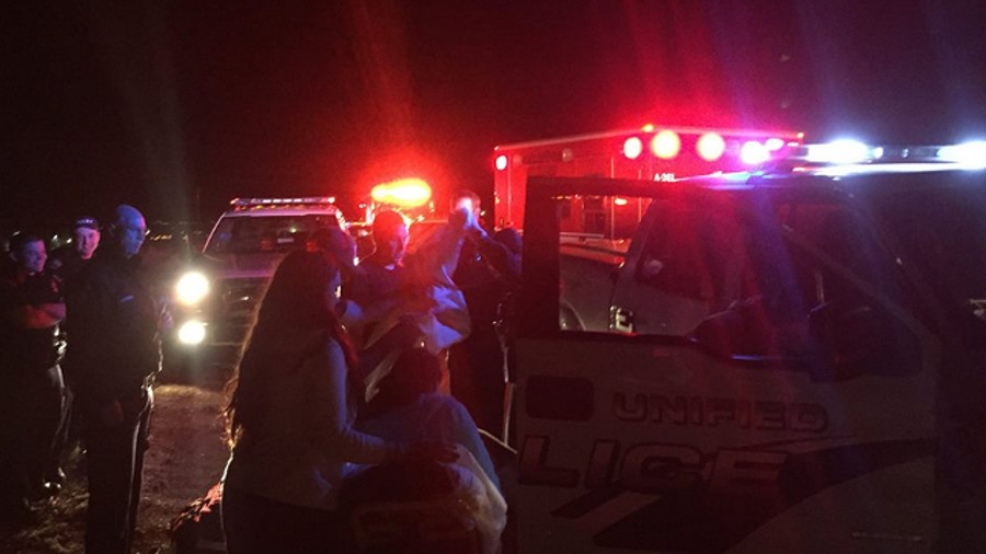 Unified Police Officer Travis Clark had his pregnant wife in his patrol car with lights and sirens activated -- but the baby just wouldn't wait.