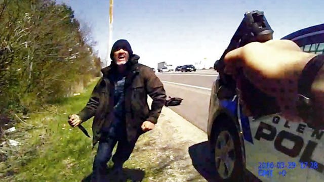 Newly released body camera video shows a man armed with a hunting knife charge at a Gendale, Ohio police officer and tell him to kill him more than 40 times.