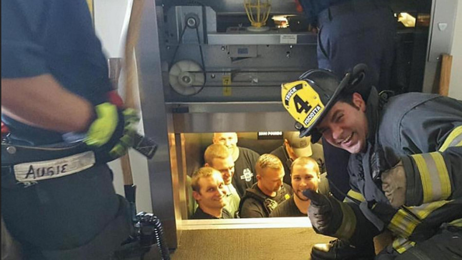 A dozen Kansas City police officers had to swallow their pride as firefighters rescued them from an elevator that malfunctioned inside the police academy.