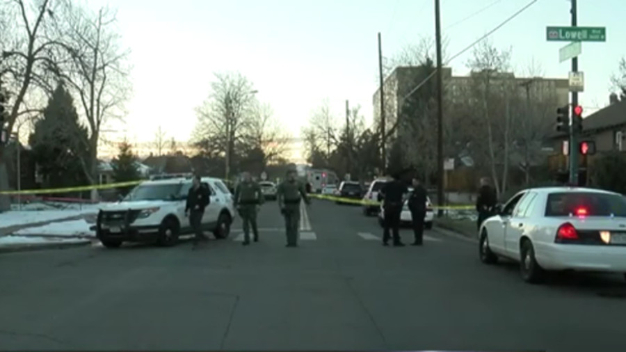 A review found that Denver SWAT Technician John Ruddy was hit by 'friendly fire' during a confrontation with a fugitive last December.