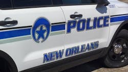 Investigators said that the officer saw the muzzle of a gun flash toward him and he jumped out of his vehicle and took cover behind it. Investigators said that the officer saw the muzzle of a gun flash toward him and he jumped out of his vehicle and took cover behind it.