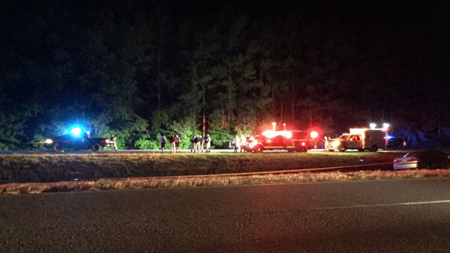 A Harris County deputy approached a 1994 blue Chevrolet Caprice containing three people when the suspect opened fire, hitting him in the face above his left eye.