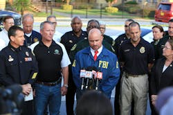 Law enforcement agencies and local city representatives give a news conference on Jane 12 in the wake of a mass-casualty shooting at the Pulse nightclub in Orlando, Fla.