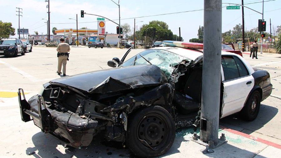 A Los Angeles County Sheriff's deputy had to be rescued after becoming trapped inside her cruiser following a crash Sunday morning.