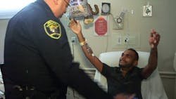 Pulse nightclub shooting victim Angel Colon, right, reunites with Eatonville Police Officer Omar Delgado. Pulse nightclub shooting victim Angel Colon, right, reunites with Eatonville Police Officer Omar Delgado.