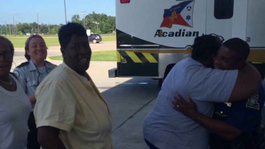 A Louisiana State Police trooper receives a heartfelt thank you from family members of the located child and grandfather.