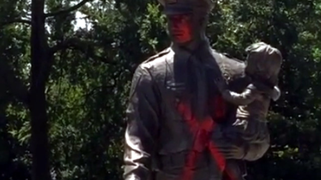 The Richmond Police Memorial statue of an officer holding a child was found tagged with a big red 'X' and 'Justice for Alton' sprayed on the ground.