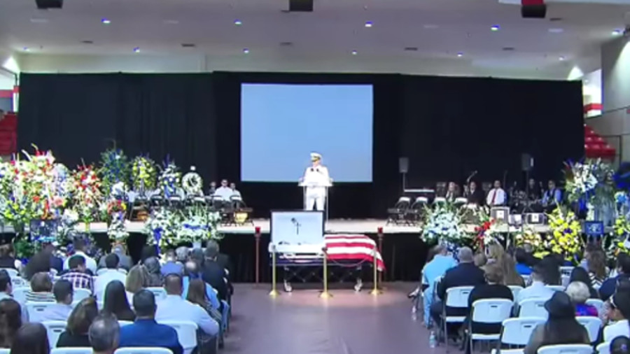 Fallen Dallas Police Officer Patricio 'Patrick' E. Zamarripa, who served eight years with the Navy and was an active Navy Reservist, was posthumously promoted at his funeral on Friday.