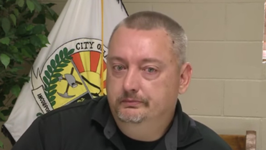 Hackett Police Chief Darrell Spells, who was wounded in a shooting last week that claimed the life of a deputy, returned to work just two days after the incident.