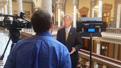 Indiana State Senator Jim Merritt speaks to the media about legislation that would protect law enforcement officers who are attacked while off duty.
