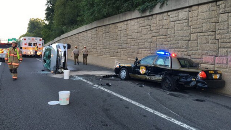 Maryland State Police Trooper Samuel Morris rescued a driver from a burning car after his cruiser was sideswiped Saturday morning.