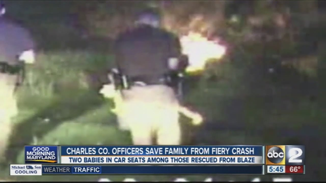 Officers Rescue Family of Five From Burning Car | Officer