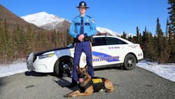 Trooper Chris Havens poses with K-9 Helo Trooper Chris Havens poses with K-9 Helo