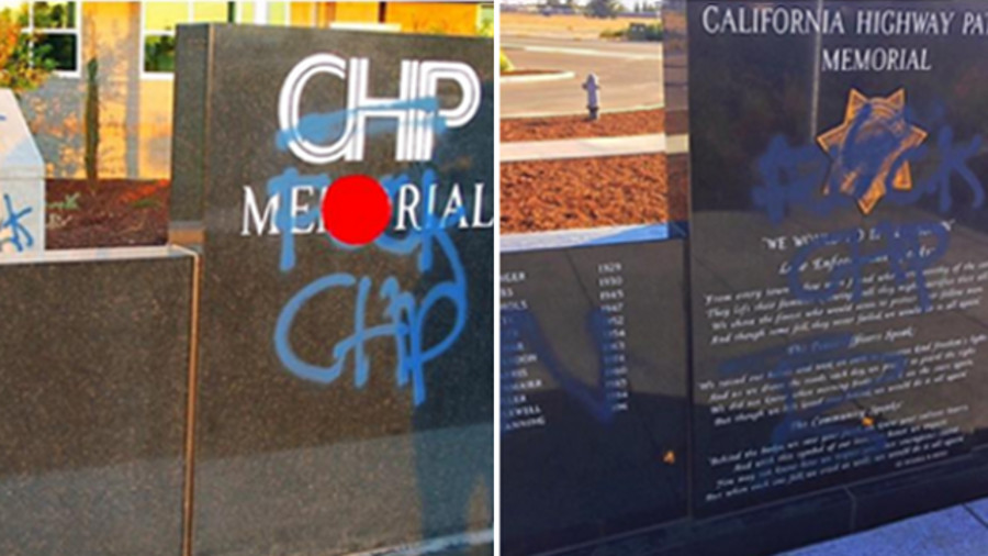 Officials said that blue paint was used to scrawl obscene language across the memorial and perimeter walls outside a new office in Bakersfield on Tuesday.