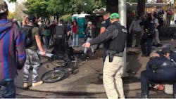 Police officers in Eugene were making a drug arrest in the city's downtown Friday afternoon when they were confronted by an angry mob. Police officers in Eugene were making a drug arrest in the city's downtown Friday afternoon when they were confronted by an angry mob.