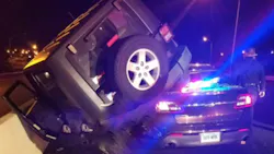 Connecticut State Trooper Patrick Dwyer had to be extricated after a drunk driver drove his vehicle onto his patrol car Thursday night. Connecticut State Trooper Patrick Dwyer had to be extricated after a drunk driver drove his vehicle onto his patrol car Thursday night.