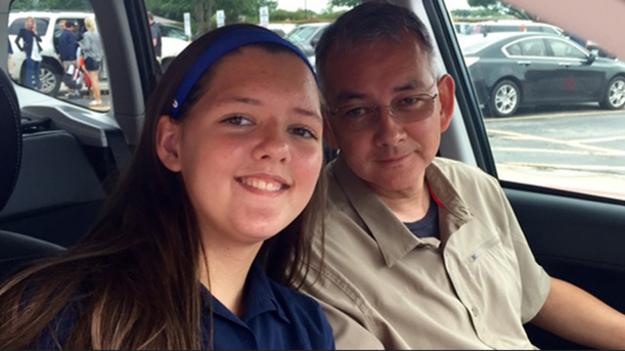 Victoria Smith, left, is seen with her father, Dallas Police Officer Michael Smith, who was killed in an ambush.