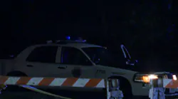 Two police officers were shot and killed in ambush-style attacks while sitting in their patrol cars early Tuesday morning.