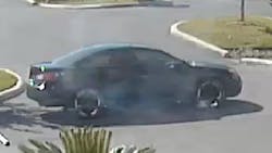 A San Antonio police officer was issuing a traffic citation when a black vehicle -- seen fleeing the scene in the photo -- pulled up behind the officer patrol car and the driver walked up to the cruiser's window, firing one round inside that struck the officer in the head. A San Antonio police officer was issuing a traffic citation when a black vehicle -- seen fleeing the scene in the photo -- pulled up behind the officer patrol car and the driver walked up to the cruiser's window, firing one round inside that struck the officer in the head.