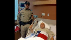 Texas Department of Public Safety Trooper Danny Shaw is seen in the hospital with his partner, Trooper Brandon Zellous.