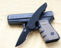 Three for on in a photo: A Glock 38 sporting Talon Grips and accompanied by a Benchmade knife. A winning team up!