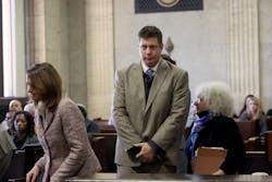 Jason Van Dyke walks past several attorneys including Assistant Attorney General Barbara Greenspan, right, on his way to the bench. Former police officer Jason Van Dyke with his attorney Dan Herbert stands in front of Judge Vincent Gaughan at the Leighton Criminal Courts Building on Thursday, December 8, 2016 for a hearing on the shooting death of Laquan McDonald in Chicago.