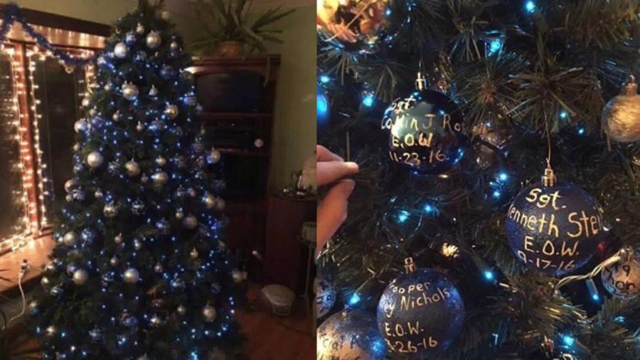 The officer said that he and his partner accidentally went to the incorrect address while on a run and came upon a Christmas tree honoring fallen officers.