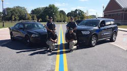 Woolwich Township police officers pose with a new blue line in Gloucester County on Oct. 6, 2016.