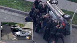 Officers Rescue Woman From Her Car After It Flipped Over During Chase