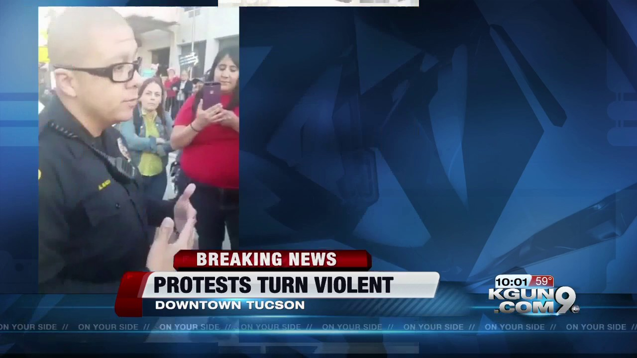 Protesters clash with police downtown