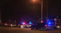 A Louisville police officer was wounded and a suspect was fatally shot Saturday night.