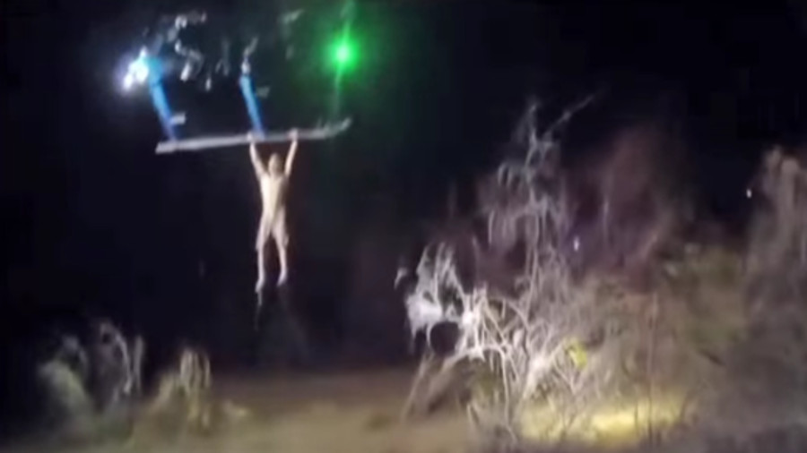 Mesa police officers rescued a man stranded in a river with the use of a department helicopter last week.