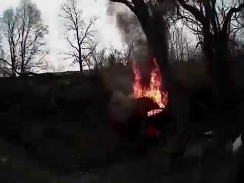 Deputy pulls man away from crashed car on fire