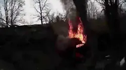 Deputy pulls man away from crashed car on fire