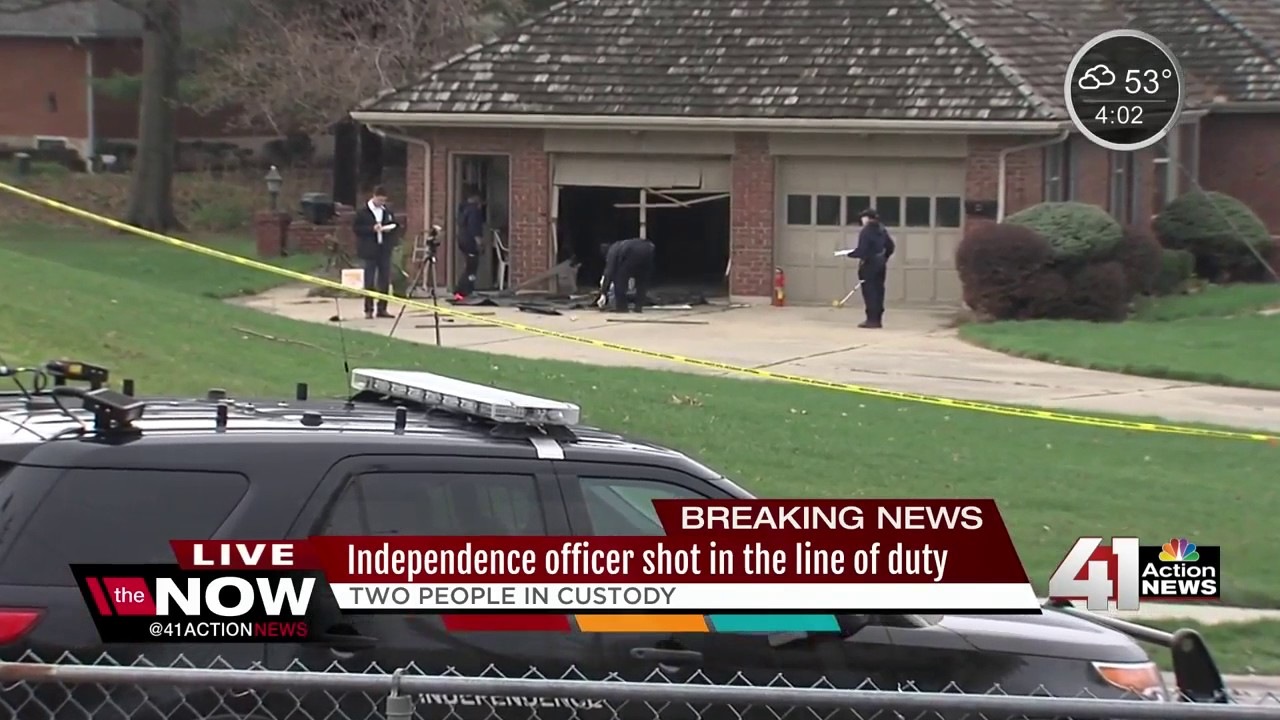 Police collecting evidence where officer was shot