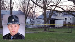 Trooper Jacob Ridgeway was driving through Muncie around 6 p.m. in his marked cruiser when he noticed white smoke coming from the rear of a residence. Trooper Jacob Ridgeway was driving through Muncie around 6 p.m. in his marked cruiser when he noticed white smoke coming from the rear of a residence.