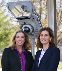 Laura Jones, CEO, Regent Power, LLC and Kathleen Griggs, President, Databuoy Corporation stand in front of the Smart City Streetlight Laura Jones, CEO, Regent Power, LLC and Kathleen Griggs, President, Databuoy Corporation stand in front of the Smart City Streetlight